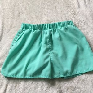 mint / green shorts